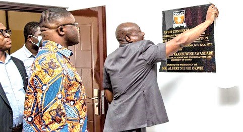 Professor Gordon A. Awandare (right), the Pro Vice-Chancellor for Academic and Students Affairs, unveiling the plaque to officially open the conference room